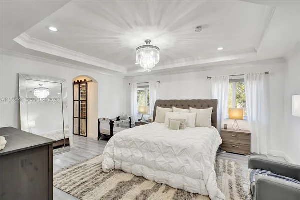 a spacious bathroom with a double vanity sink tub and mirror