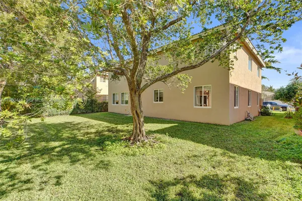 a view of backyard of house