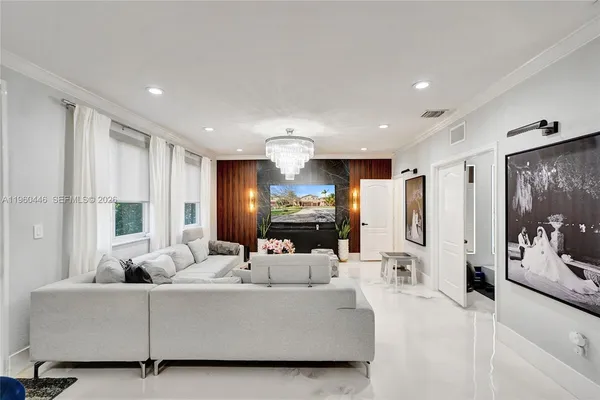 a kitchen with stainless steel appliances a stove a sink a refrigerator and cabinets