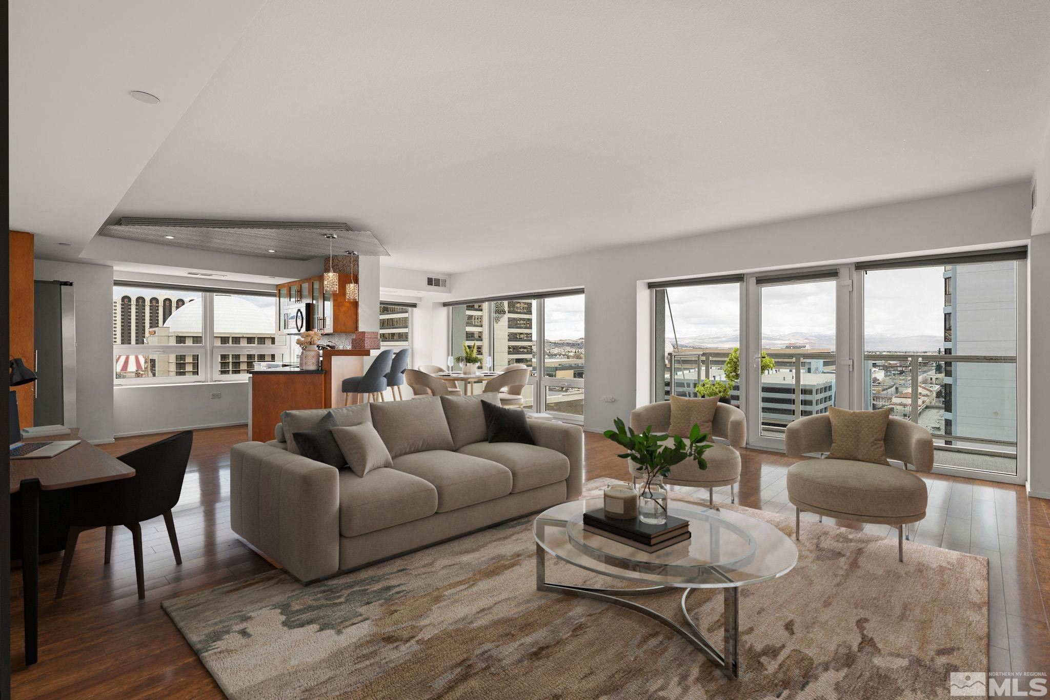 255 North Sierra Street, Unit 1011 Reno, NV 89501 - Photo 1 of 40 a living room with furniture and a large window