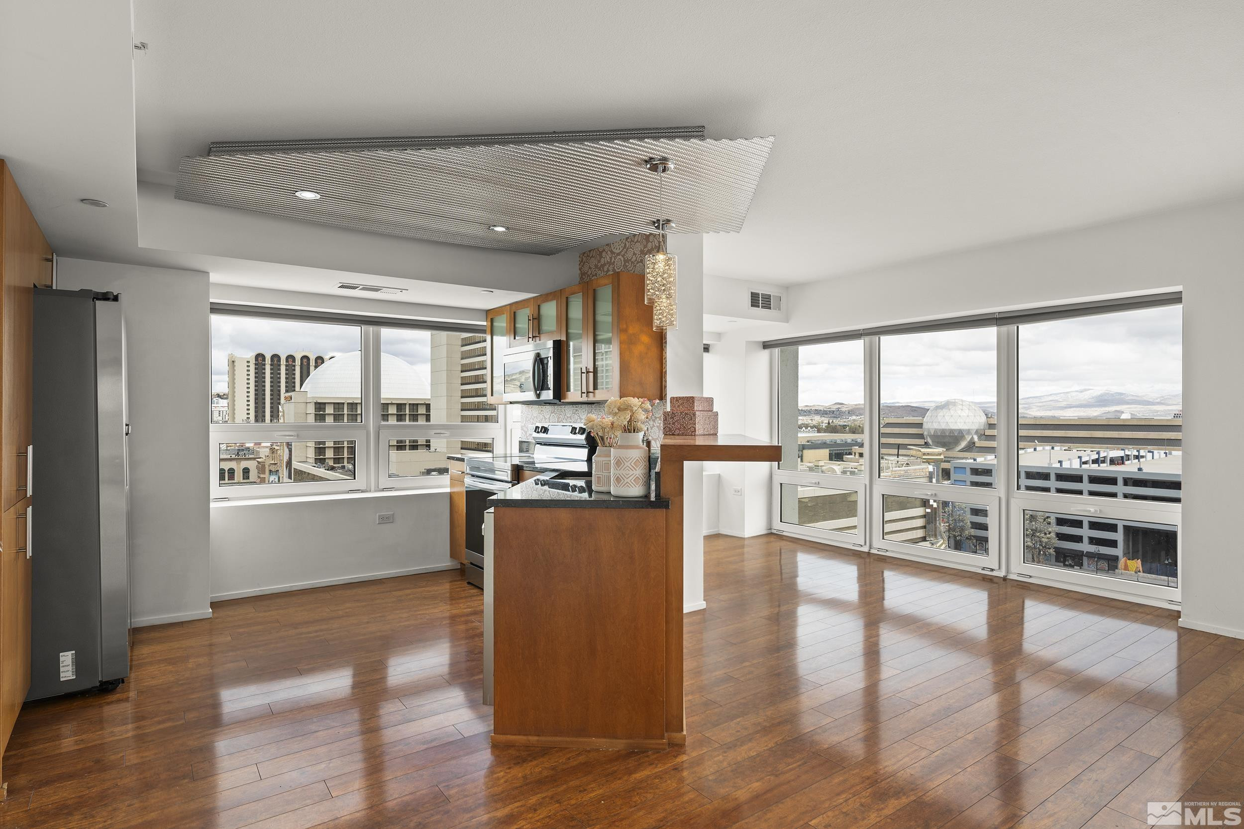 255 North Sierra Street, Unit 1011 Reno, NV 89501 - Photo 11 of 40 a living room with furniture and a large window