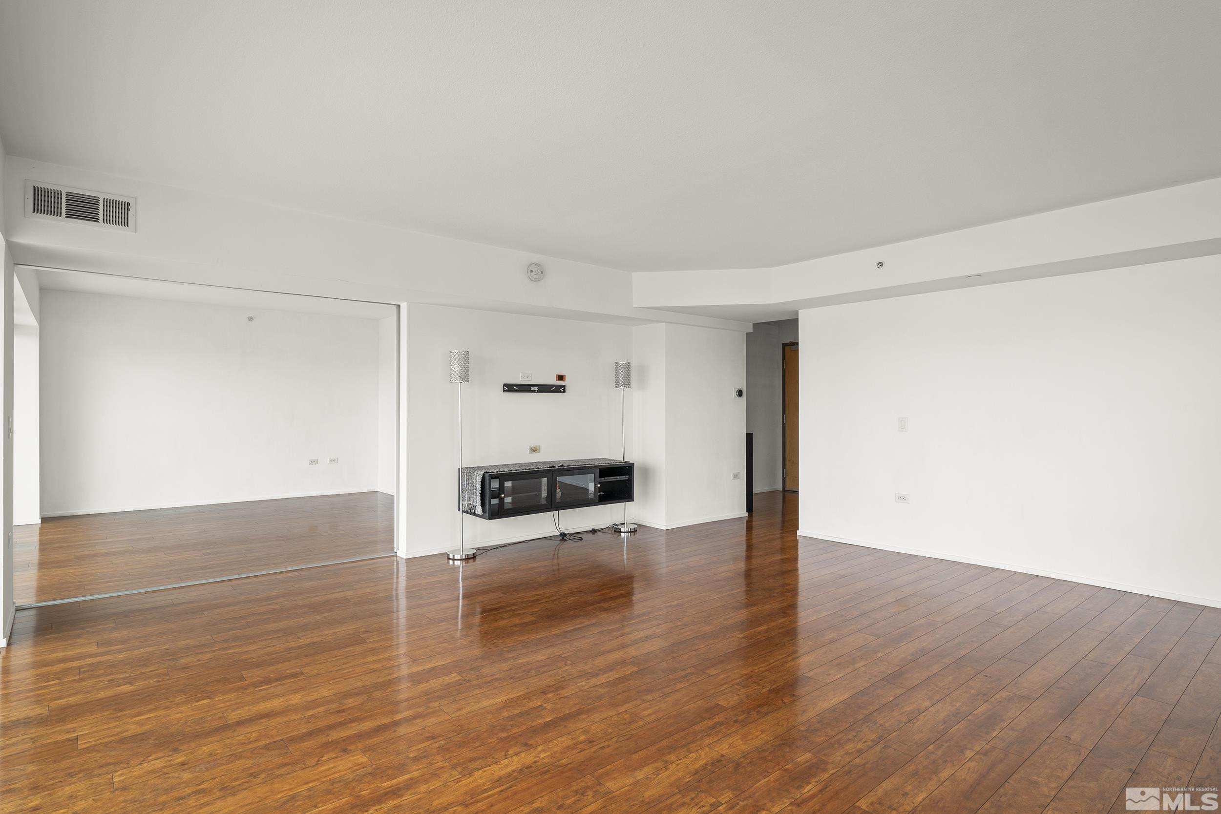 255 North Sierra Street, Unit 1011 Reno, NV 89501 - Photo 12 of 40 a view of a kitchen with wooden floor