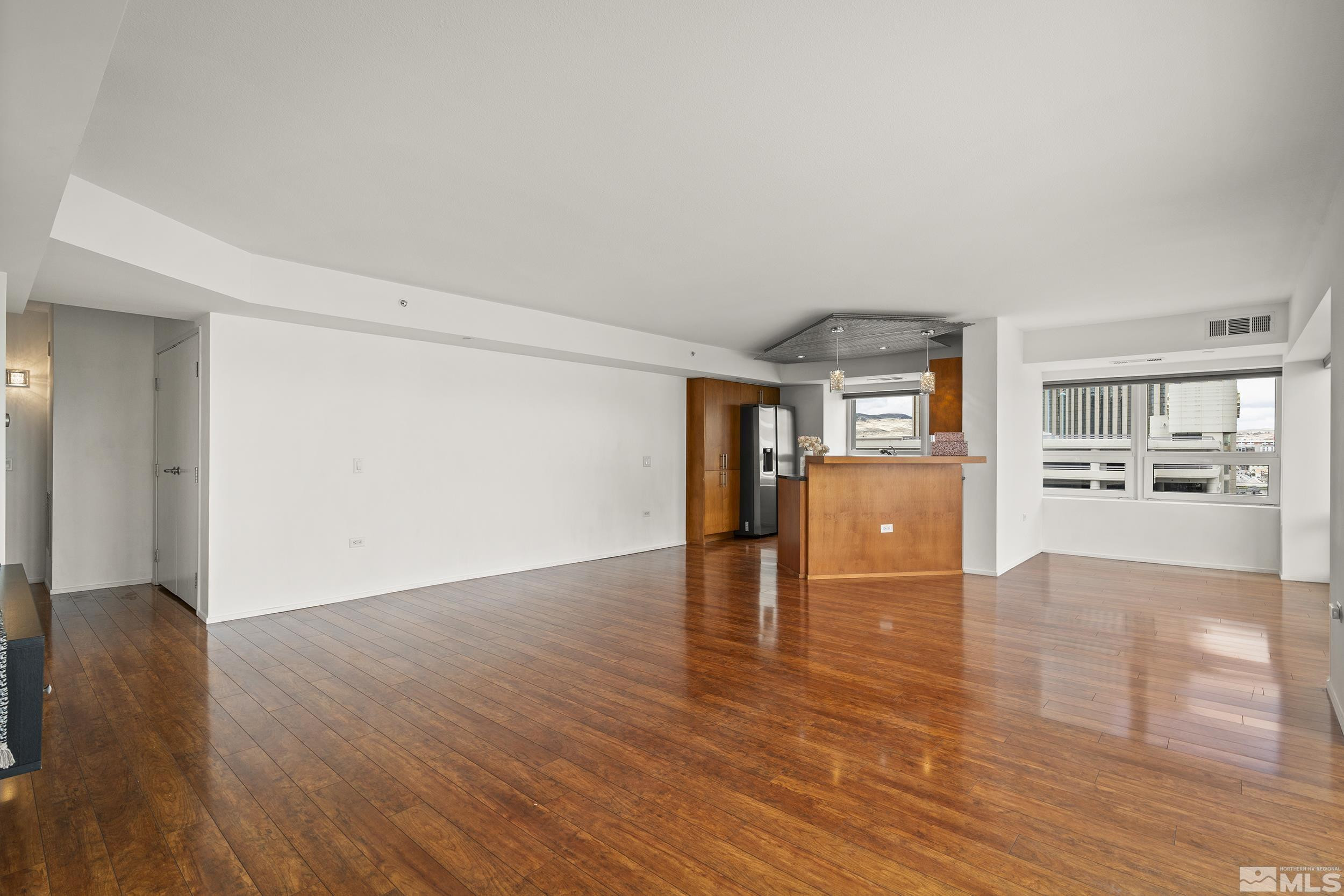 255 North Sierra Street, Unit 1011 Reno, NV 89501 - Photo 13 of 40 a view of empty room with wooden floor