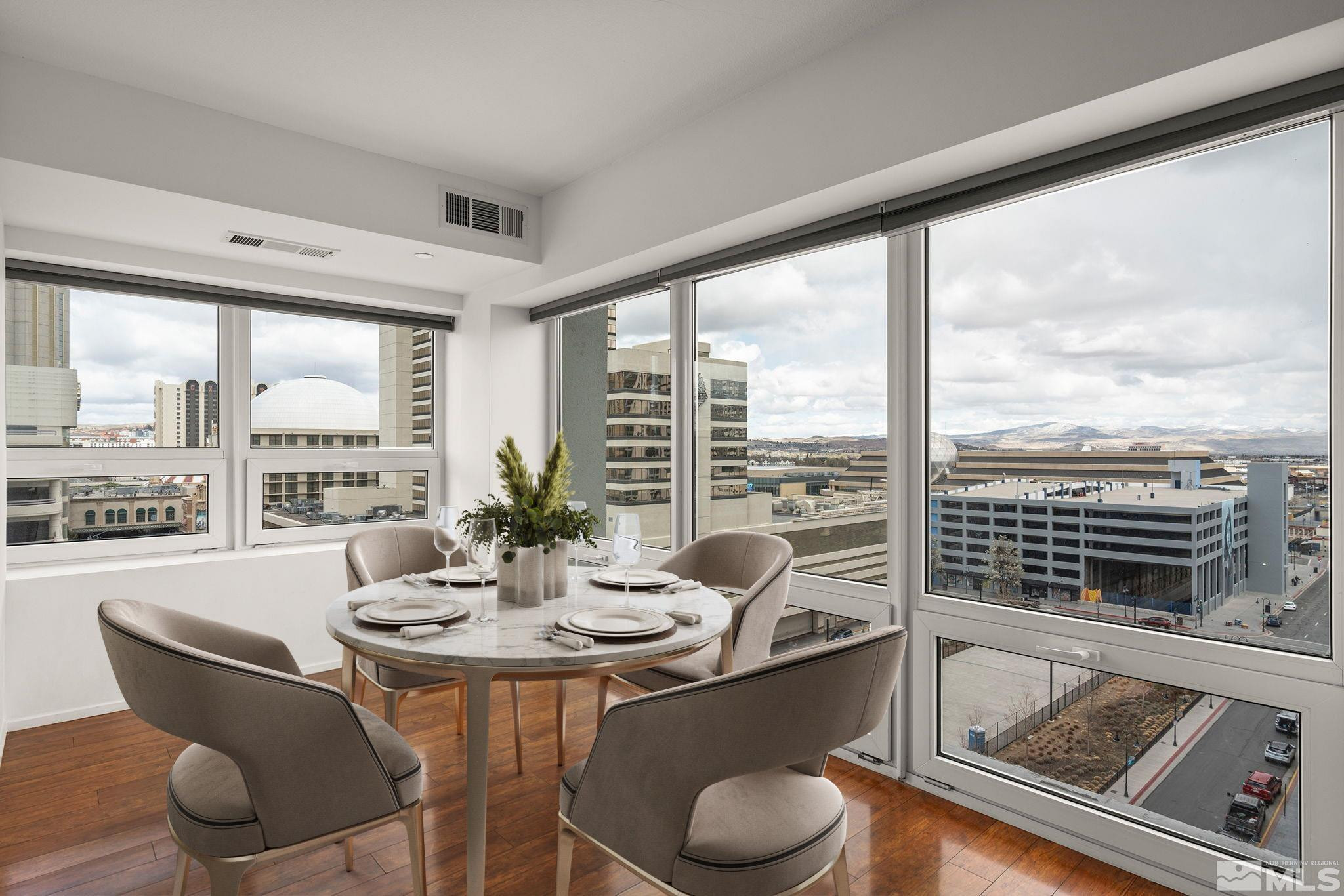 255 North Sierra Street, Unit 1011 Reno, NV 89501 - Photo 2 of 40 a view of a dining room with furniture window and outside view