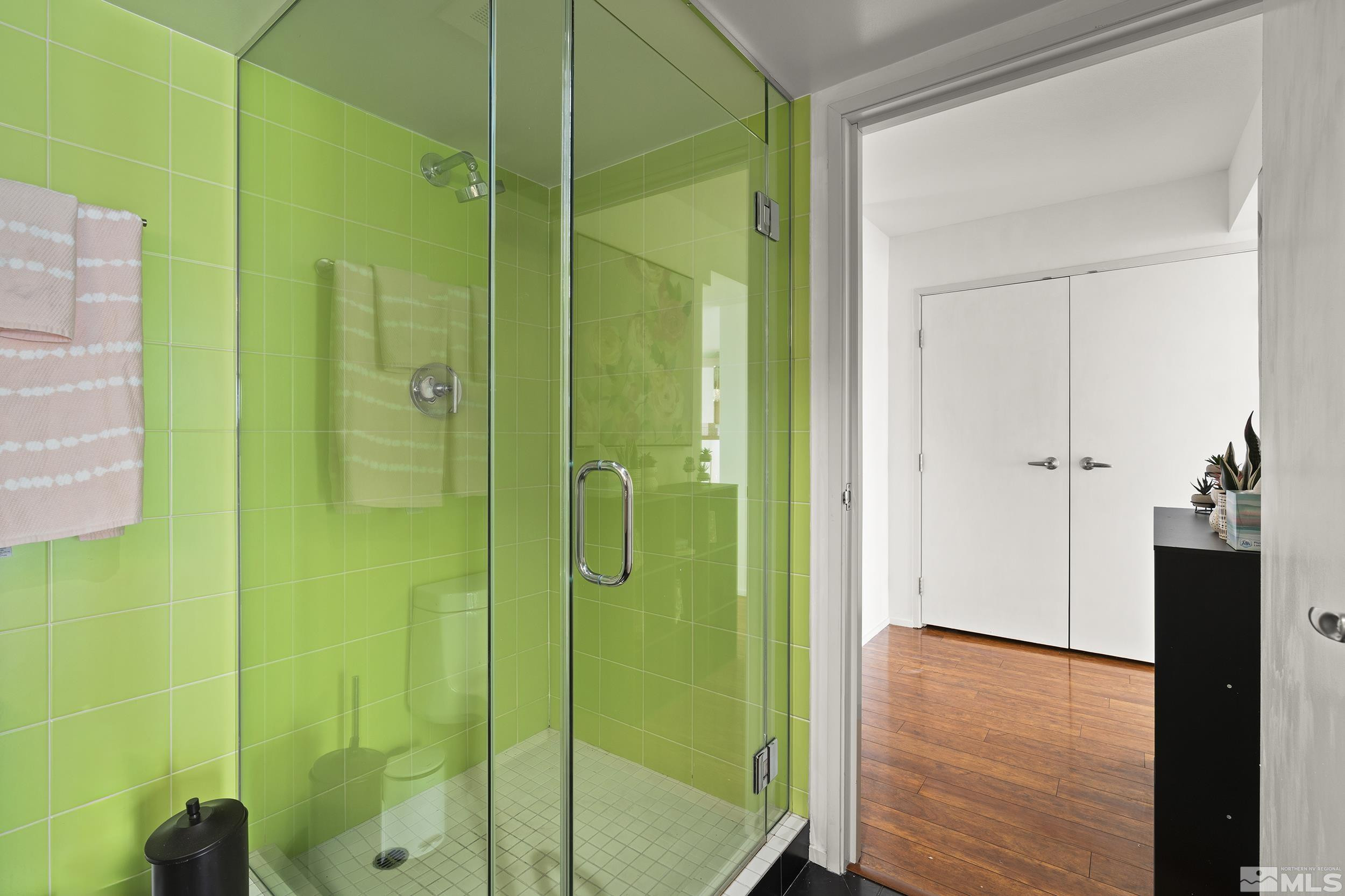 255 North Sierra Street, Unit 1011 Reno, NV 89501 - Photo 21 of 40 a bathroom with a shower and a sink