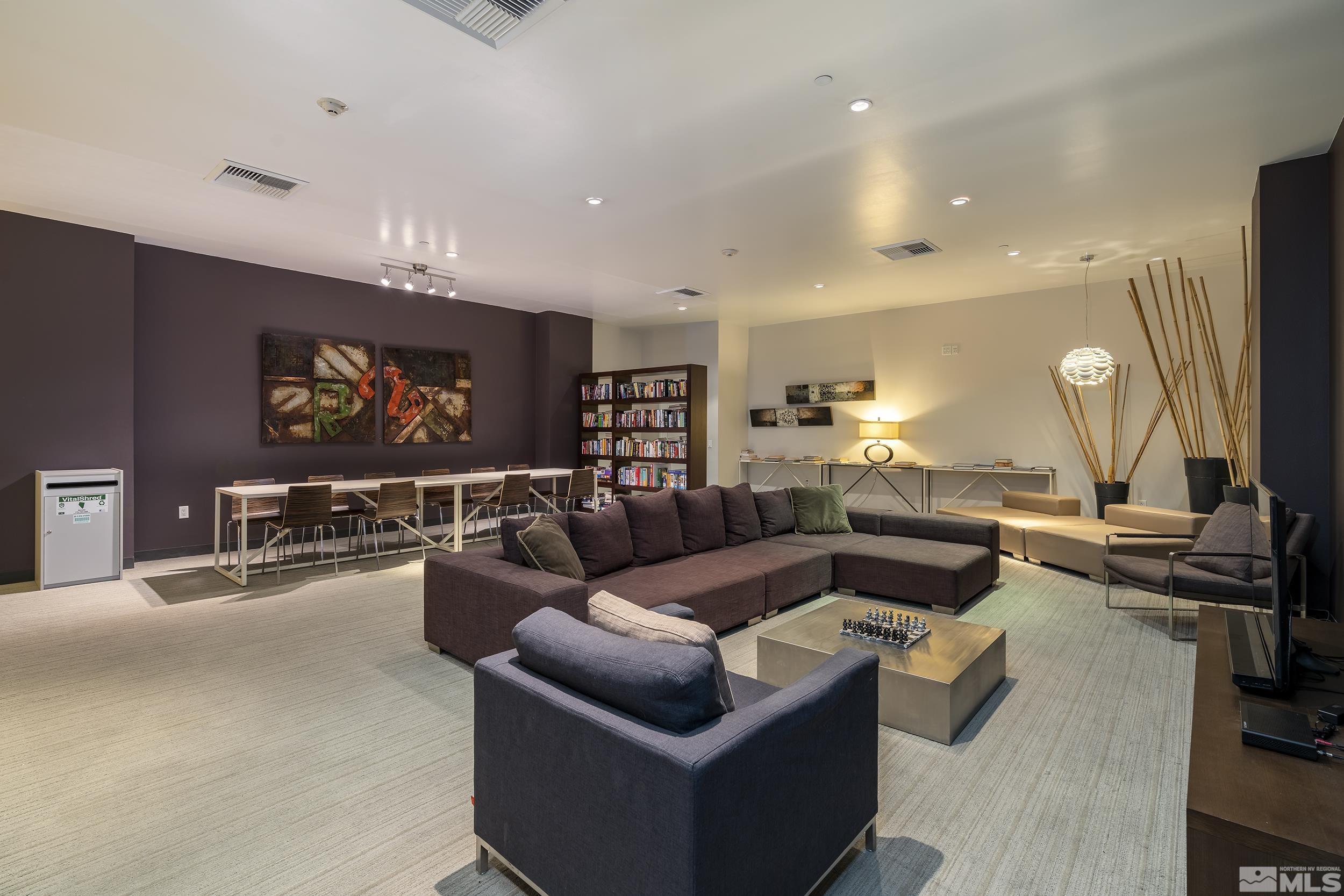255 North Sierra Street, Unit 1011 Reno, NV 89501 - Photo 28 of 40 a living room with furniture and a flat screen tv