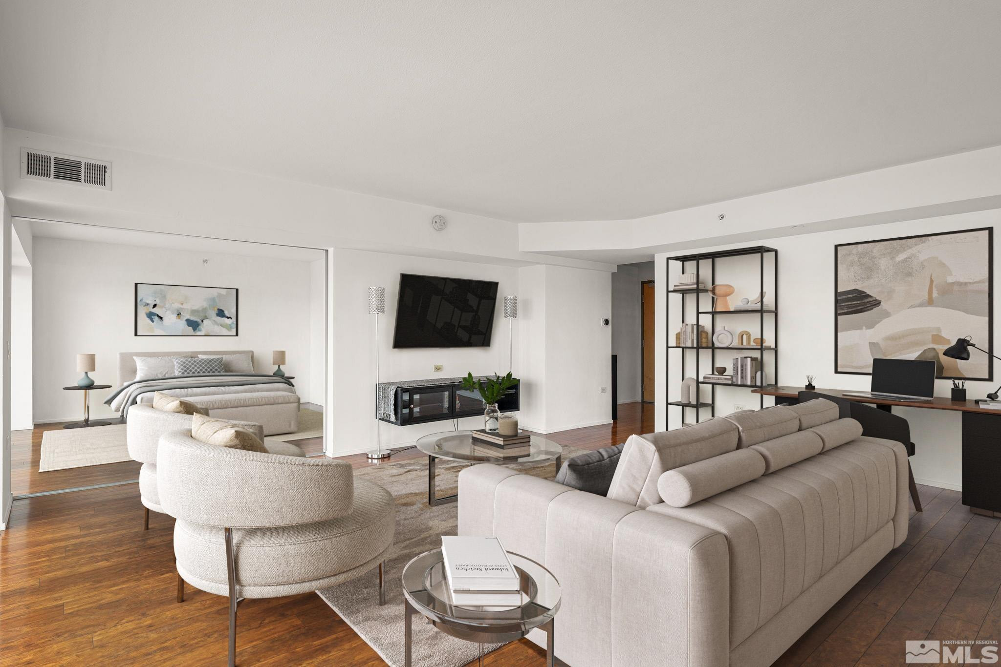 255 North Sierra Street, Unit 1011 Reno, NV 89501 - Photo 6 of 40 a living room with furniture a flat screen tv and a large window