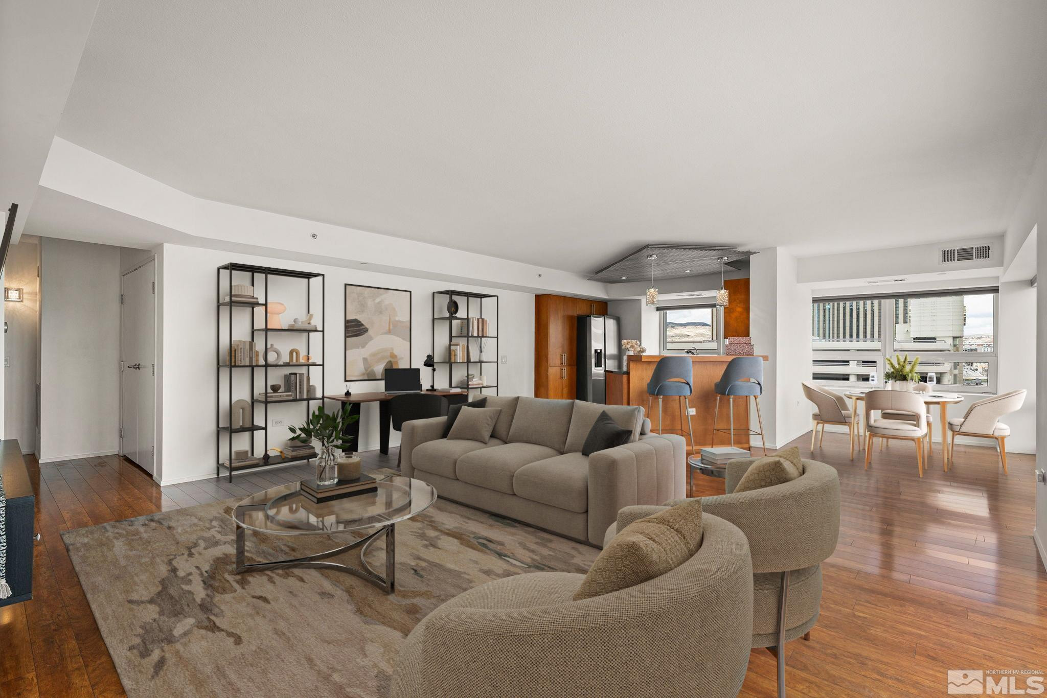 255 North Sierra Street, Unit 1011 Reno, NV 89501 - Photo 7 of 40 a living room with furniture and a wooden floor