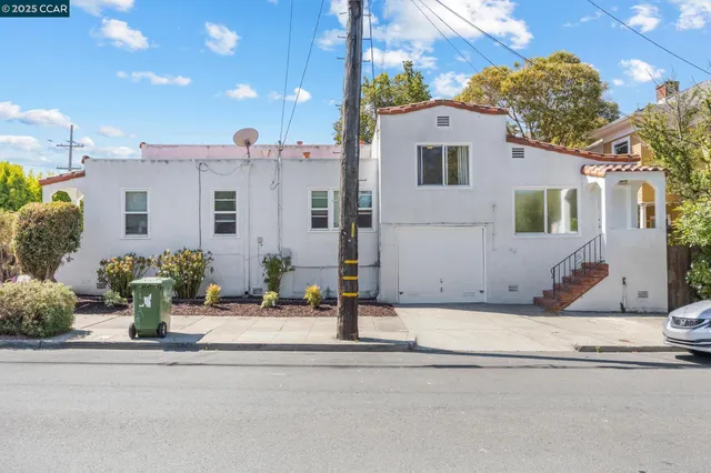 a view of a house with a street