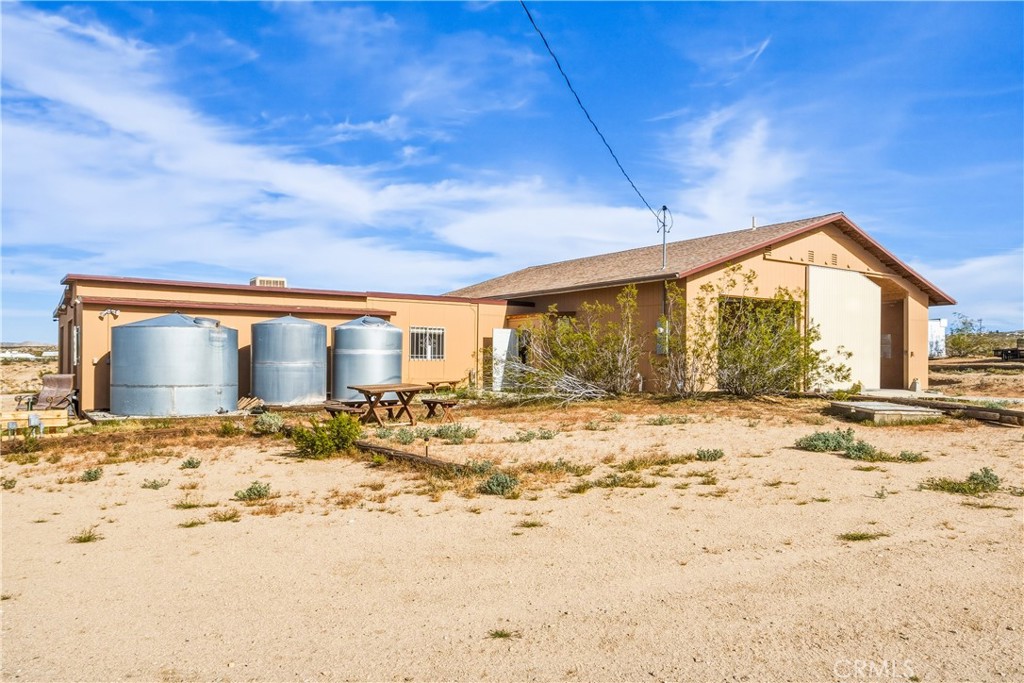 5975 Desert Star Road Johnson Valley, CA 92285 - Photo 40 of 74 a view of a house with snow on the road