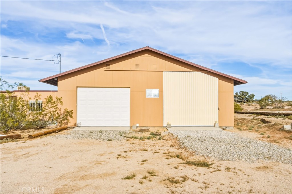 5975 Desert Star Road Johnson Valley, CA 92285 - Photo 42 of 74 a view of a big room with wooden fence