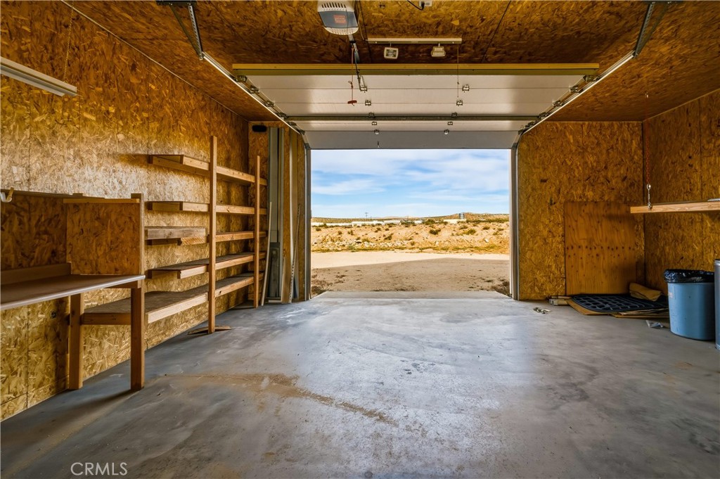 5975 Desert Star Road Johnson Valley, CA 92285 - Photo 46 of 74 a view of an empty room with storage