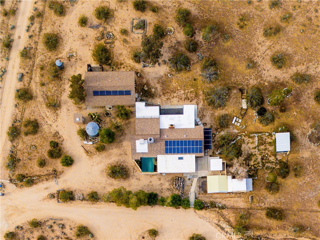 5975 Desert Star Road Johnson Valley, CA 92285 - Photo 65 of 74 a sign board with buildings in the background