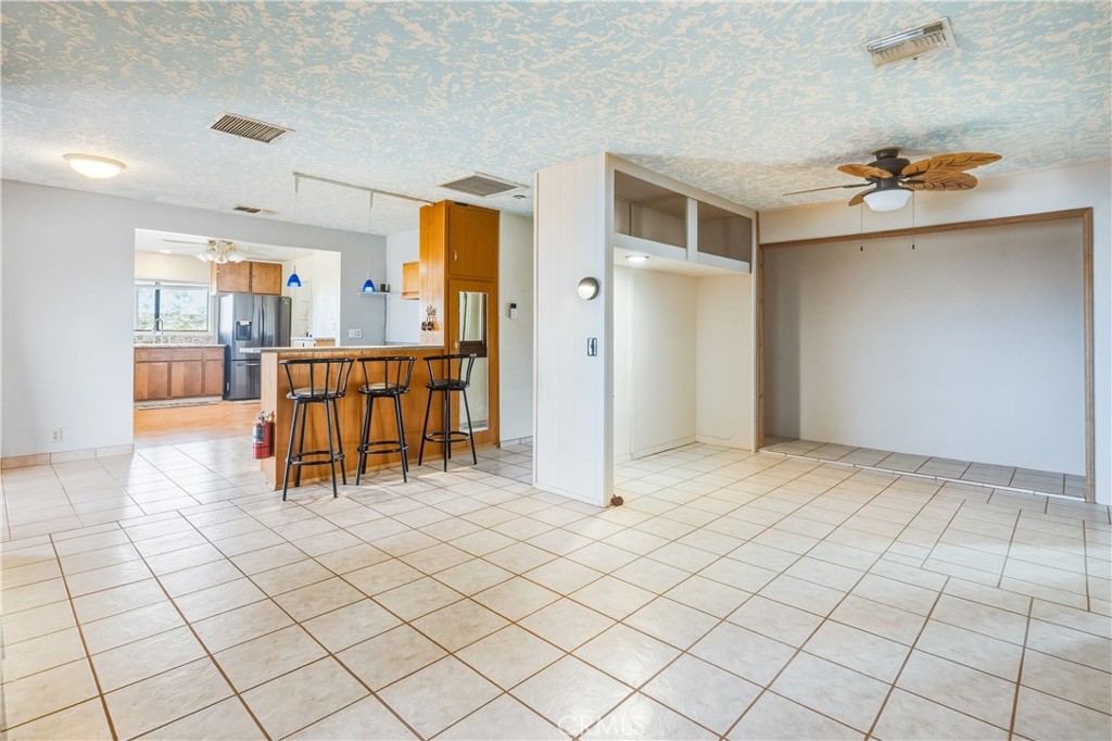 5975 Desert Star Road Johnson Valley, CA 92285 - Photo 10 of 74 a view of kitchen with furniture and window