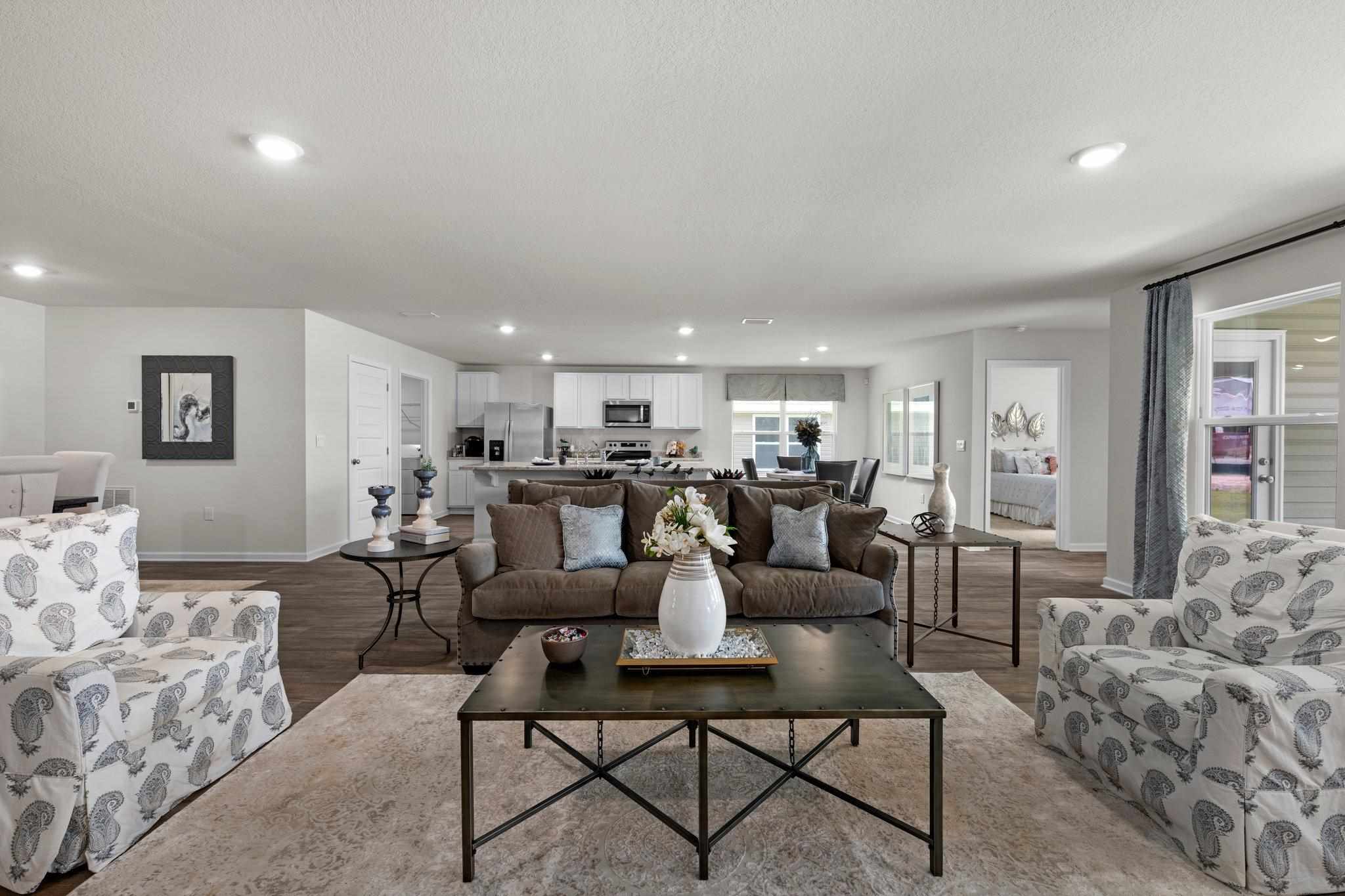 9776 Millee Loop Pensacola, FL 32526 - Photo 7 of 17 a living room with furniture and a table