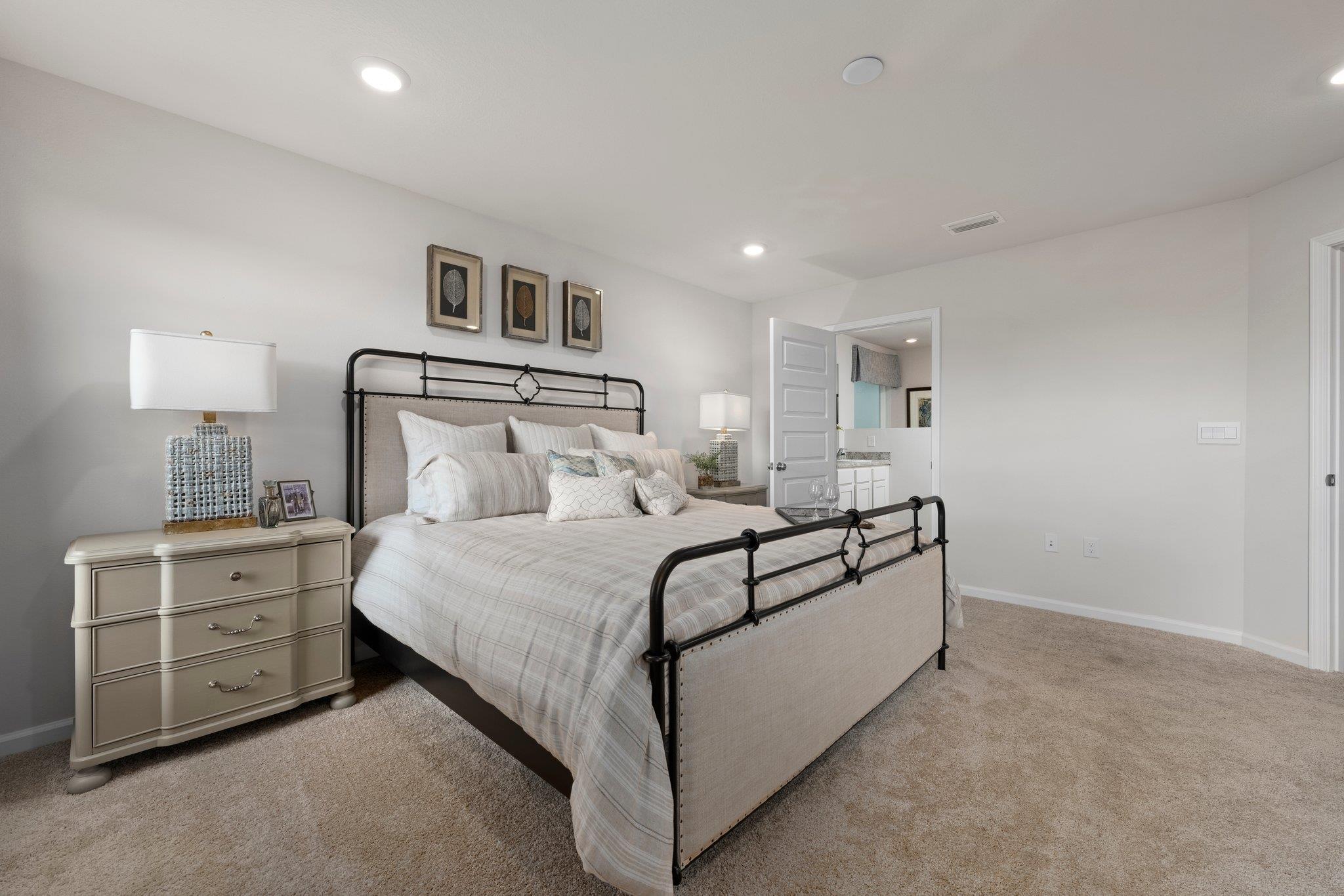 9776 Millee Loop Pensacola, FL 32526 - Photo 10 of 17 a bed room with a bed and a night stand