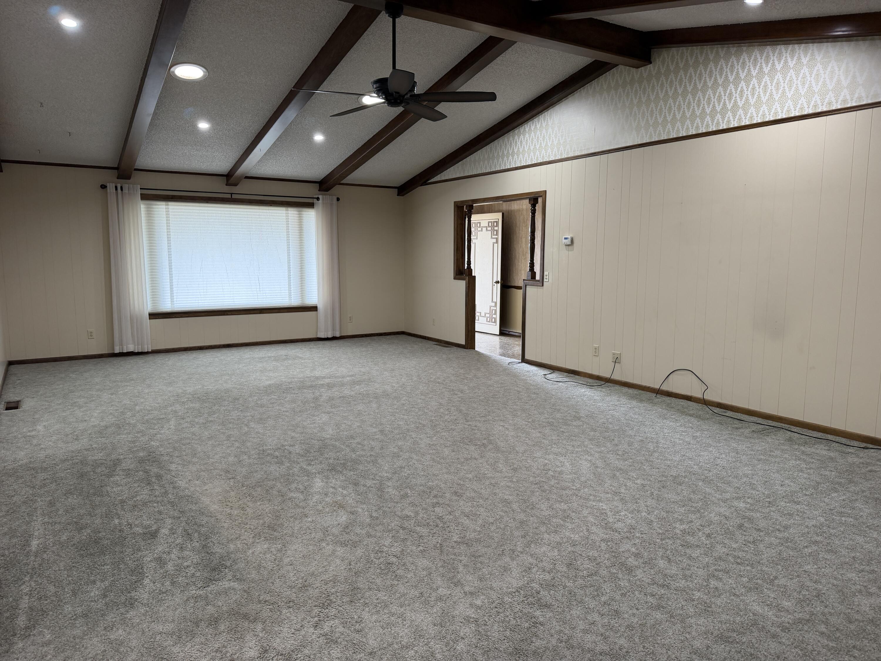 1603 South 8th Street Lamesa, TX 79331 - Photo 3 of 39 an empty room with windows