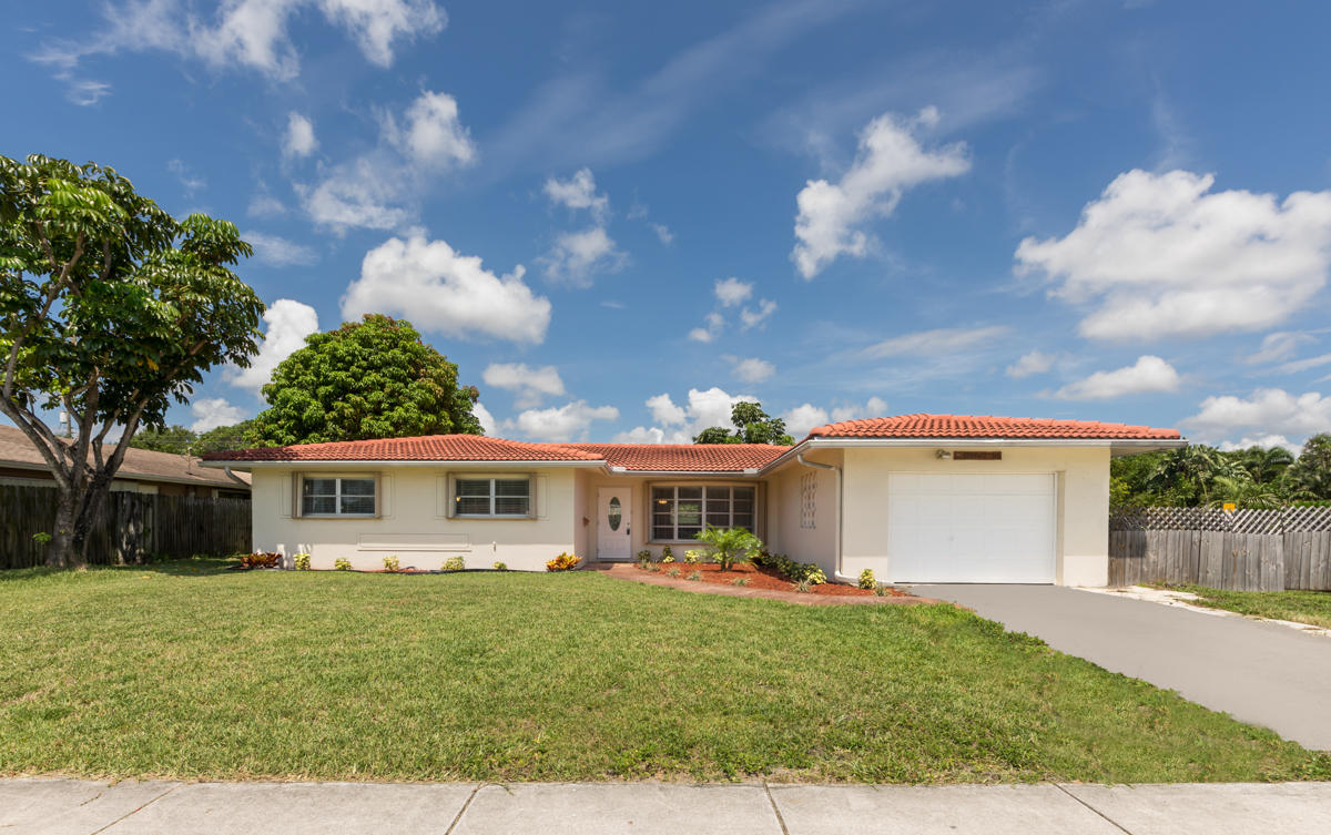 699 Northwest 12th Avenue Boca Raton, FL 33486 - Photo 1 of 21 699 NW 12th Ext Front 1