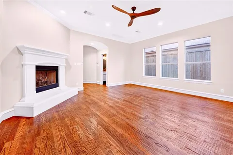 a bedroom with a bed and a fireplace