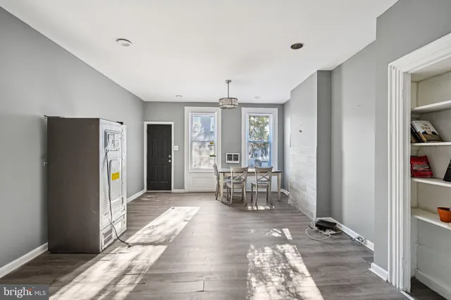 a view of a livingroom with furniture and window