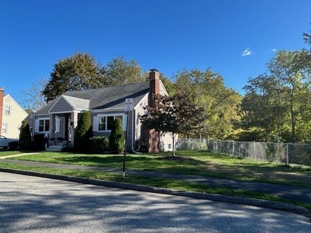28 Emory Street Saugus, MA 01906 - Photo 25 of 34 a front view of a house with a yard