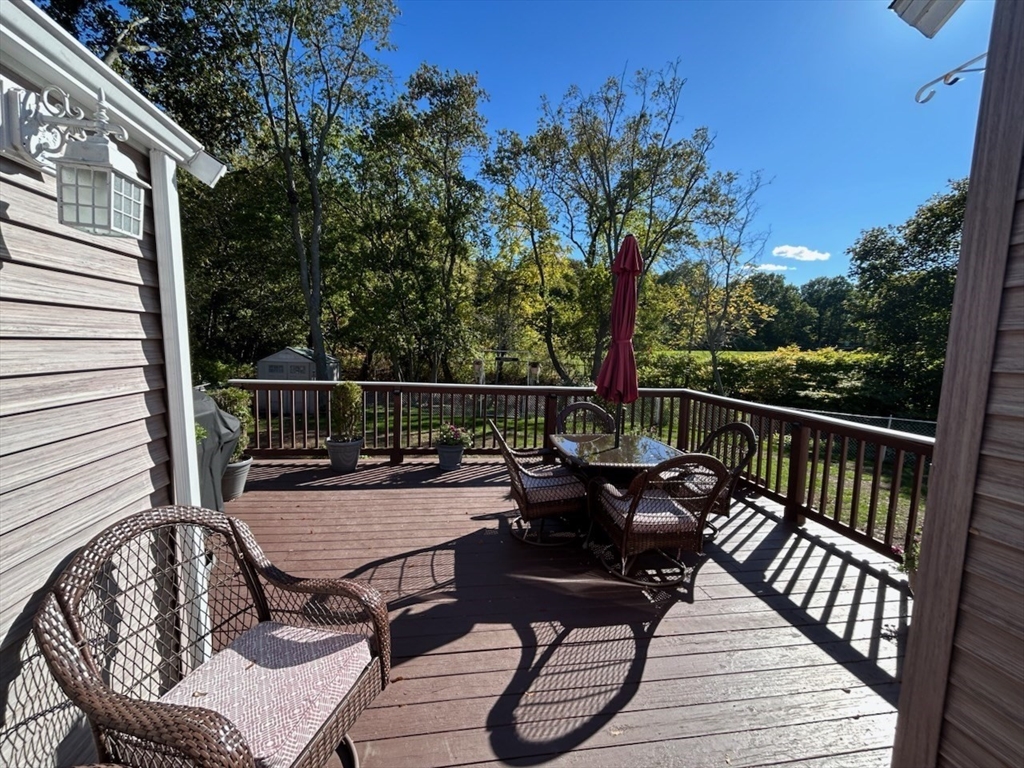 28 Emory Street Saugus, MA 01906 - Photo 8 of 34 a view of a chairs on wooden deck