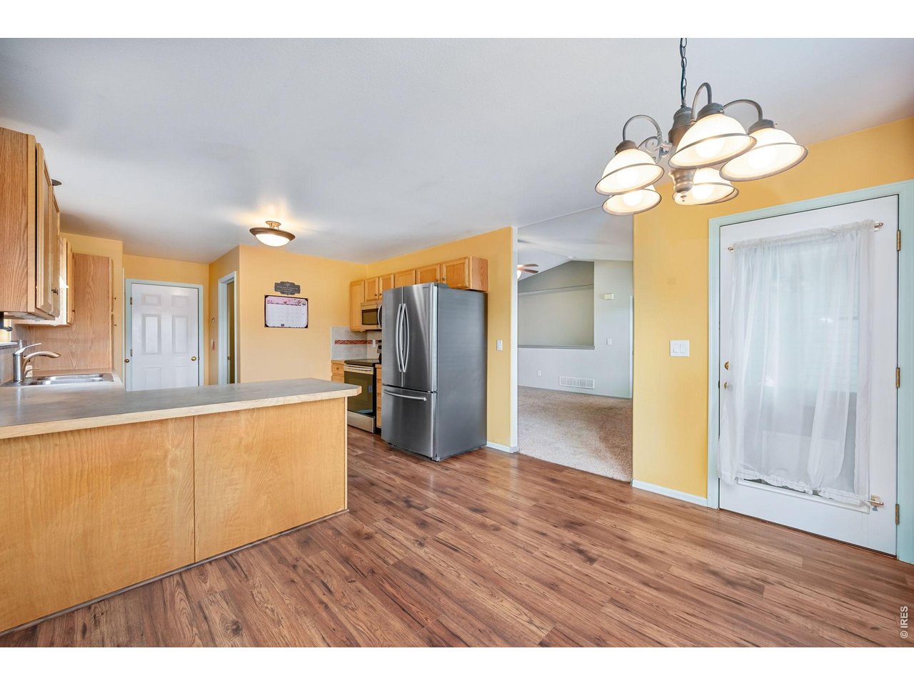17447 Margil Road Mead, CO 80542 - Photo 11 of 27 Eat in dining with patio access