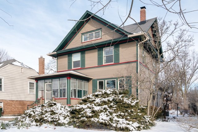 264 Shenstone Road Riverside, IL 60546 - Photo 5 of 9 a front view of a house with a yard covered with snow