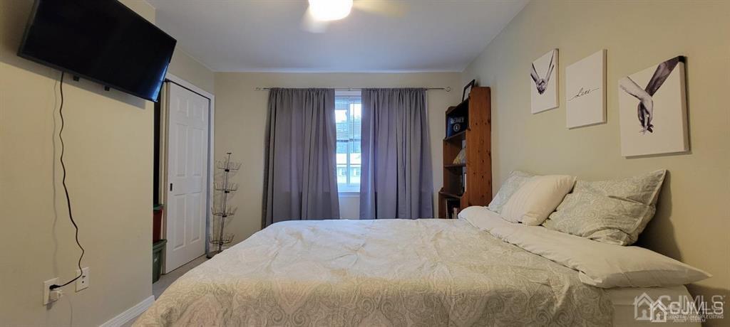 117 Shady Court Evesham, NJ 08053 - Photo 11 of 14 a bedroom with a bed and a mirror