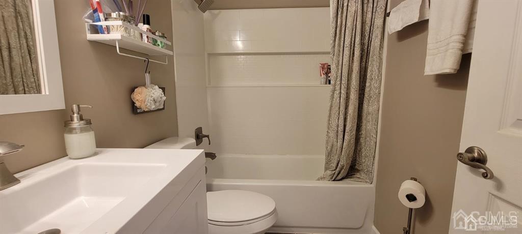 117 Shady Court Evesham, NJ 08053 - Photo 12 of 14 a bathroom with a sink toilet and shower