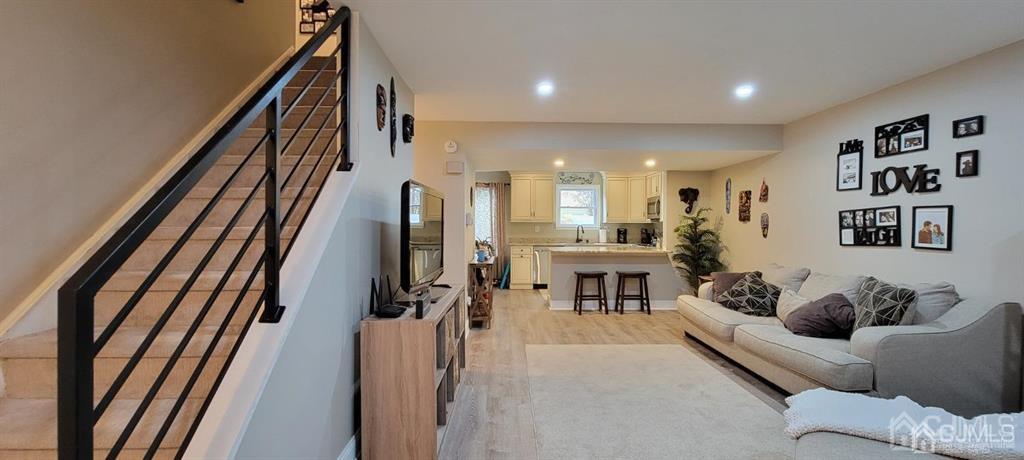 117 Shady Court Evesham, NJ 08053 - Photo 2 of 14 a living room with furniture and a flat screen tv