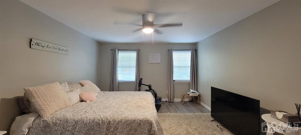 117 Shady Court Evesham, NJ 08053 - Photo 8 of 14 a bedroom with a bed and window