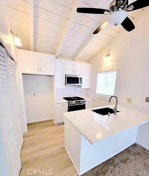 410 South Orange Avenue, Unit B Brea, CA 92821 - Photo 2 of 7 a kitchen with a sink a stove and refrigerator