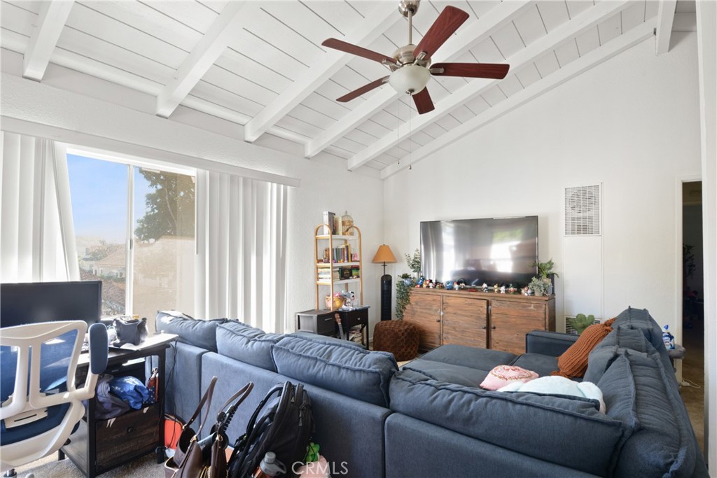410 South Orange Avenue, Unit B Brea, CA 92821 - Photo 5 of 7 a living room with furniture and a flat screen tv