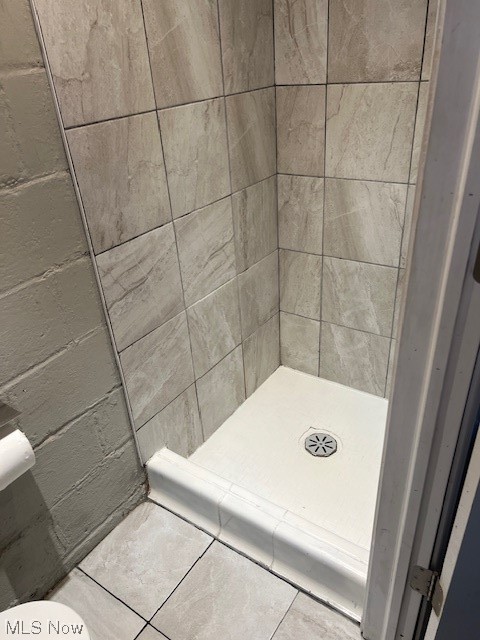 13623 Thraves Road Garfield Heights, OH 44125 - Photo 12 of 23 Bathroom featuring tiled shower