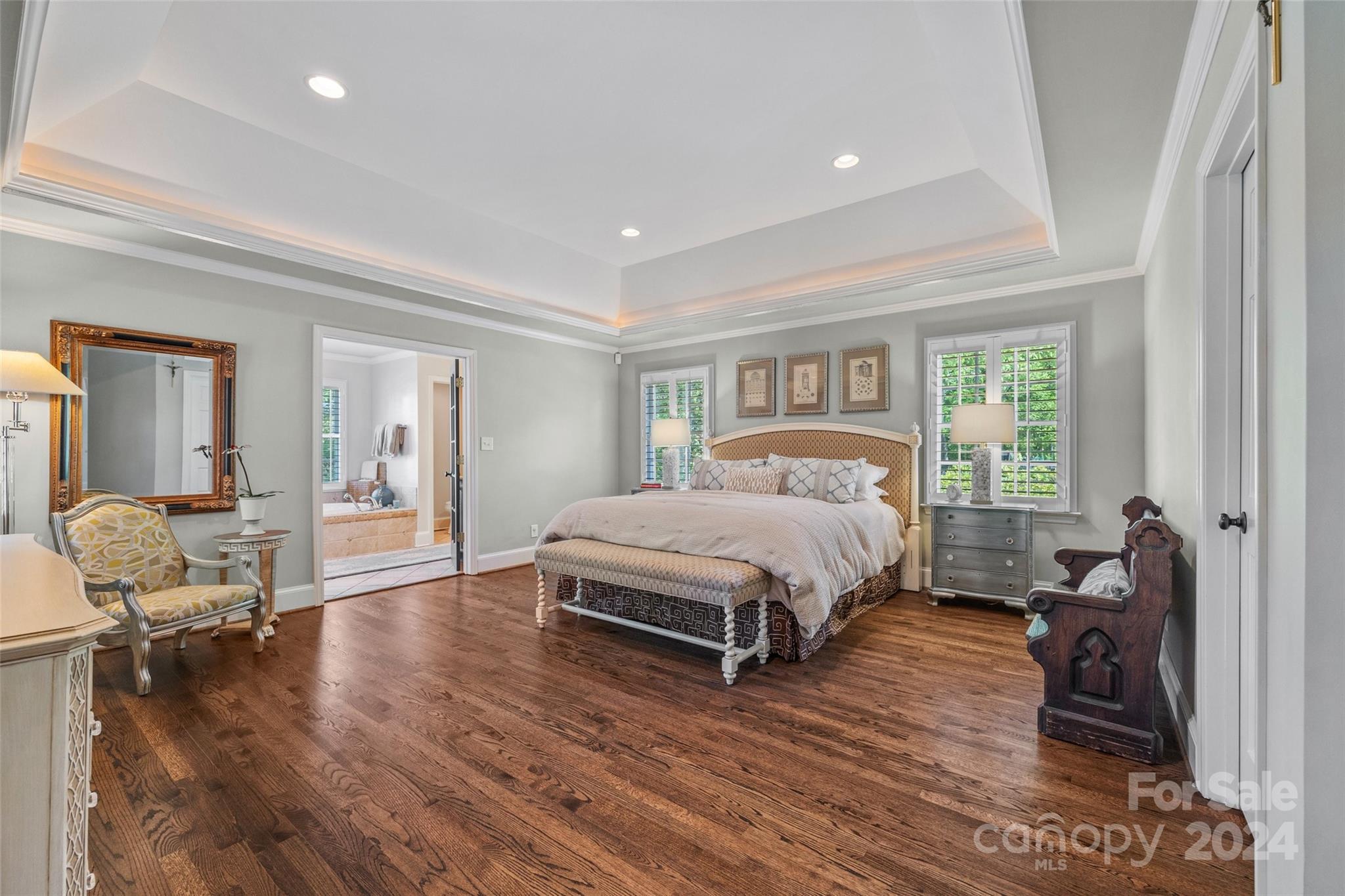 1518 Coventry Road Charlotte, NC 28211 - Photo 13 of 44 a bedroom with a bed and wooden floor