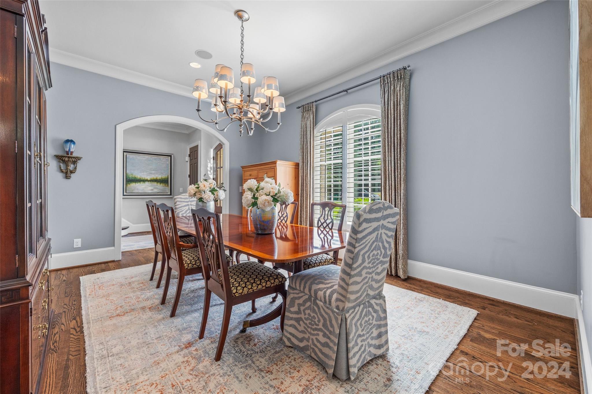 1518 Coventry Road Charlotte, NC 28211 - Photo 3 of 44 a view of a dining room with furniture and a chandelier