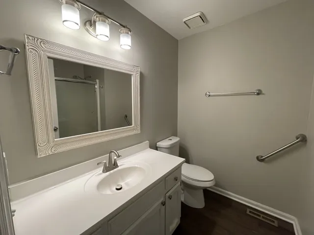 a bathroom with a sink and a toilet