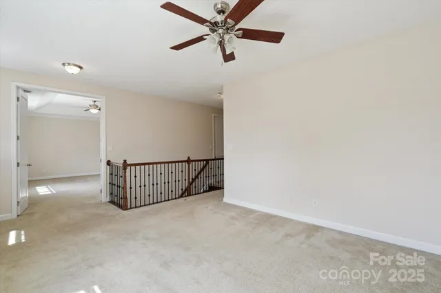 a view of a room with a fan
