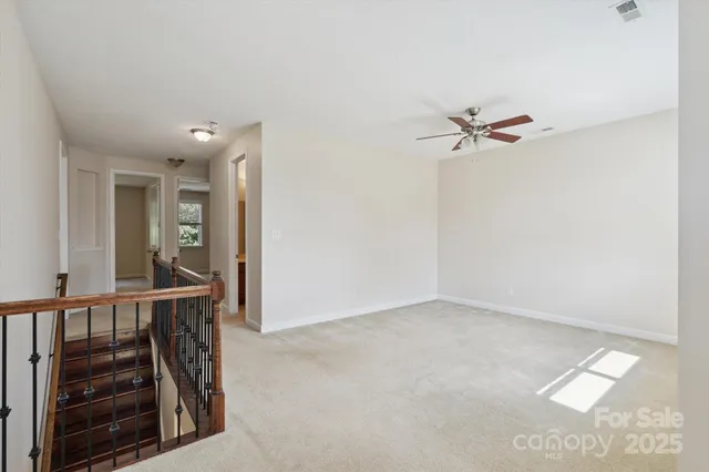 a view of a hallway with workspace