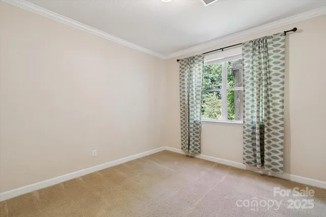 a view of a room with a large window