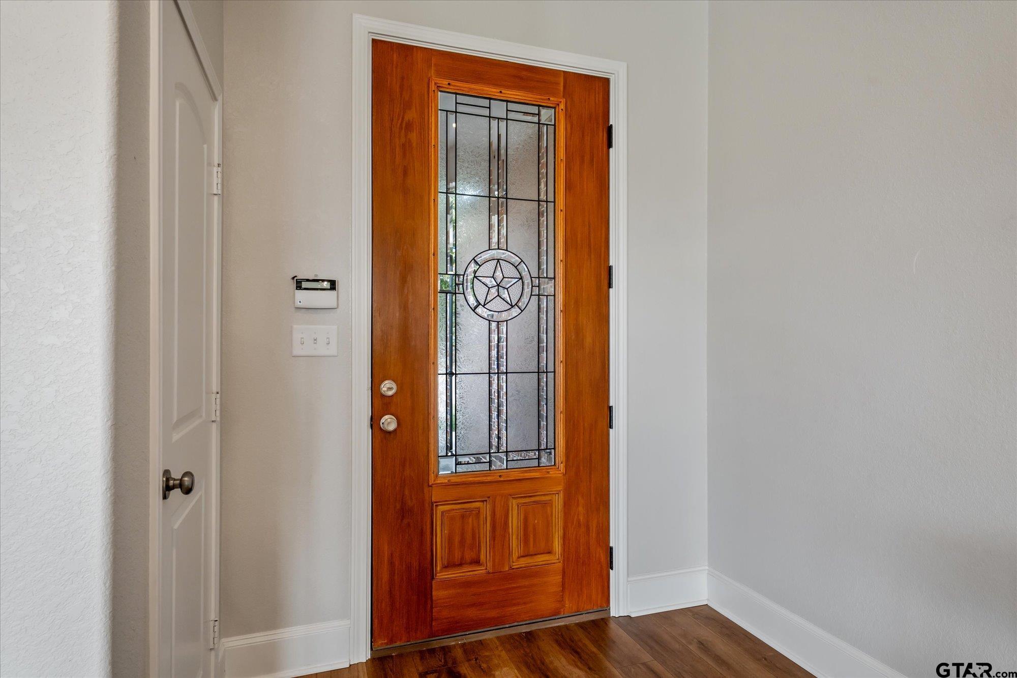 150 County Road 3602 Bullard, TX 75757 - Photo 7 of 35 a view of front door with wooden floor