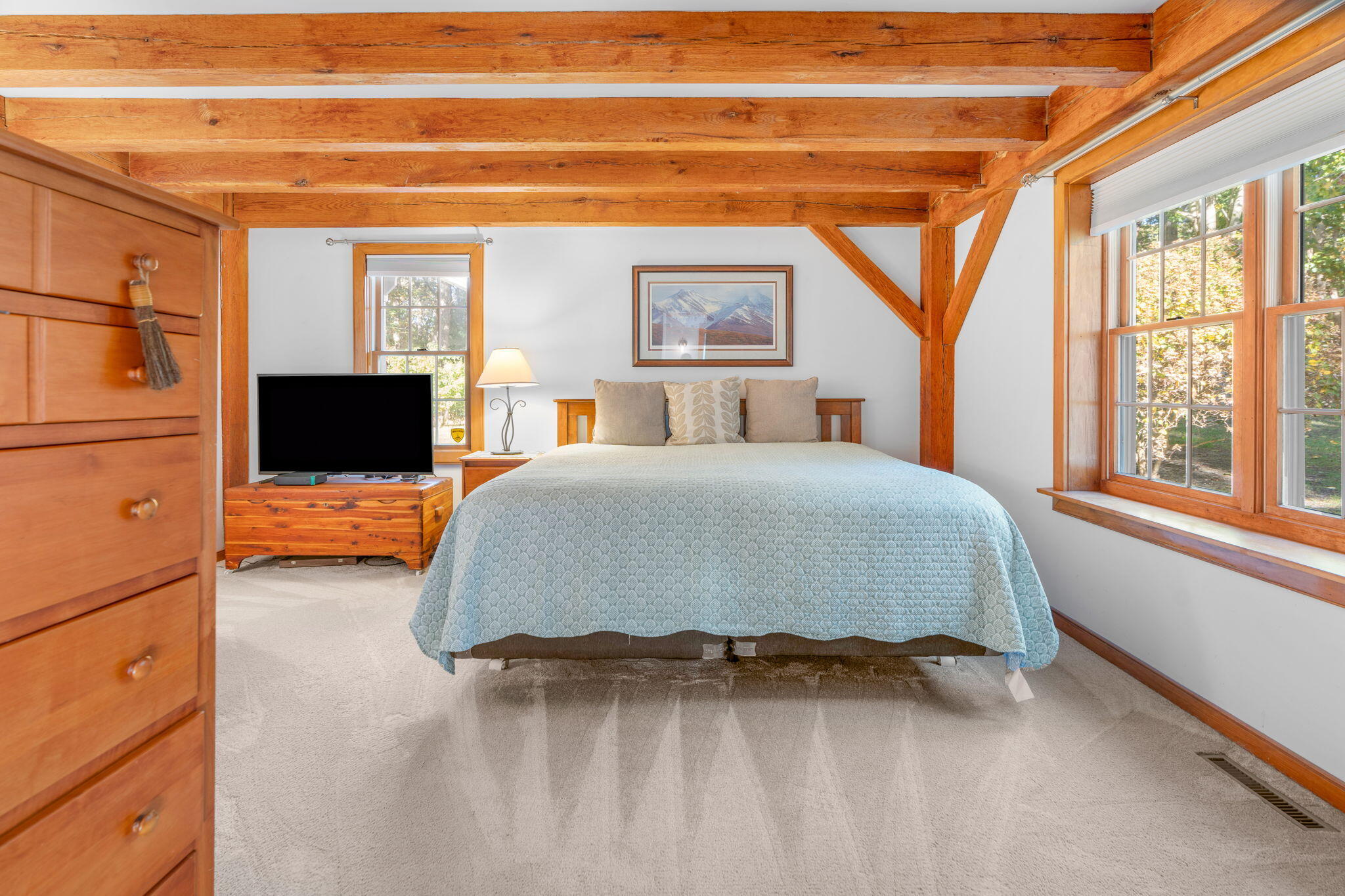 718 Cedar Street West Barnstable, MA 02668 - Photo 27 of 40 a spacious bedroom with a bed window and flat screen tv