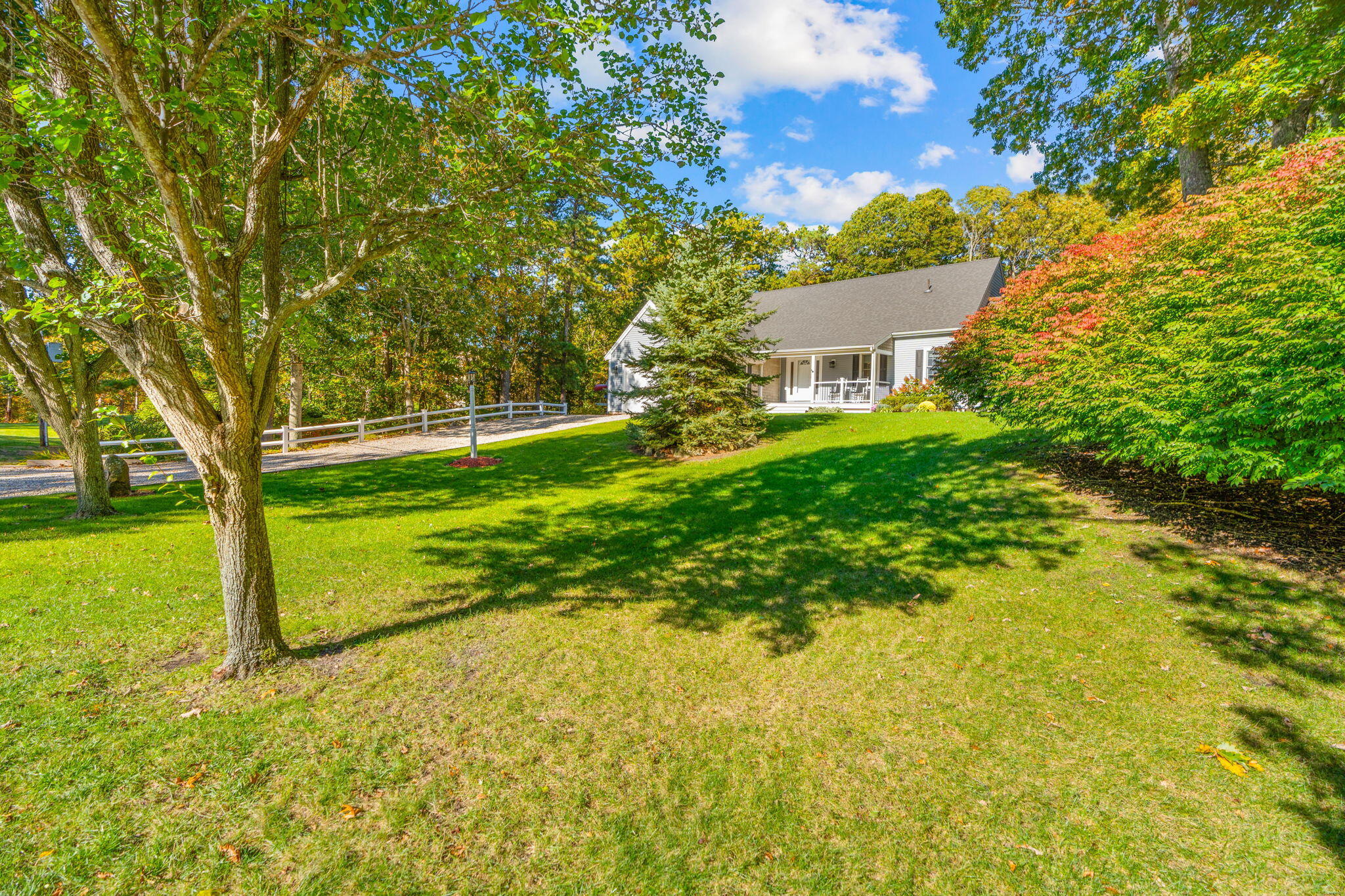 718 Cedar Street West Barnstable, MA 02668 - Photo 3 of 40 a view of a yard with a house