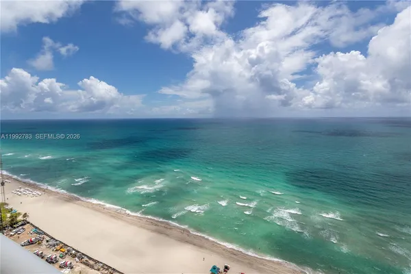 a view of a garden from a balcony