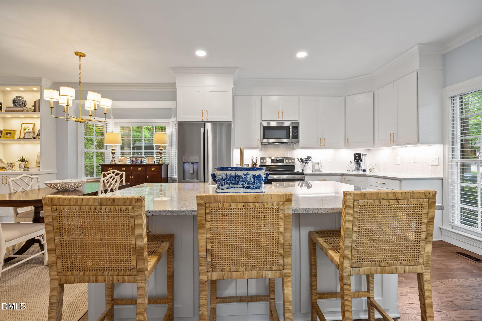 562 Weathergreen Drive Raleigh, NC 27615 - Photo 5 of 47 a kitchen with counter top space cabinets and appliances
