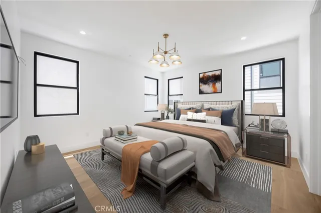 a view of a terrace with couches and lounge chairs