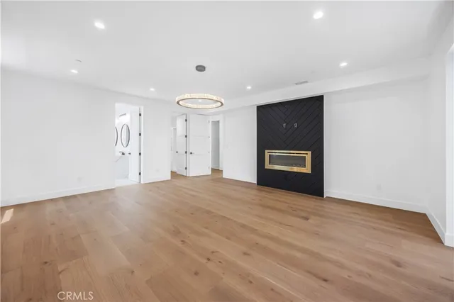 a view of balcony with wooden floor