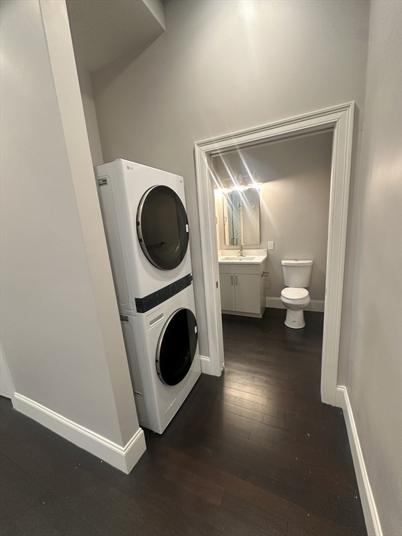 281 Franklin Street, Unit 602 Boston, MA 02110 - Photo 10 of 10 a utility room with dryer and washer