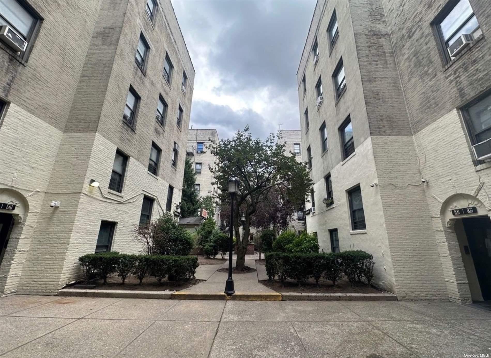 21-05 33rd Street, Unit 5F Queens, NY 11105 - Photo 3 of 4 a front view of a building